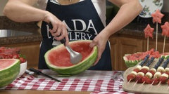 Kristi Kay scooping out a large watermelon with the RADA Ice Cream Scoop
