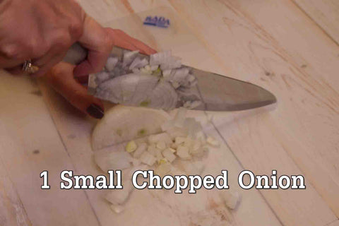 On a small chopping board, dice your Onion using RADA Cutlery's French Chef Knife!