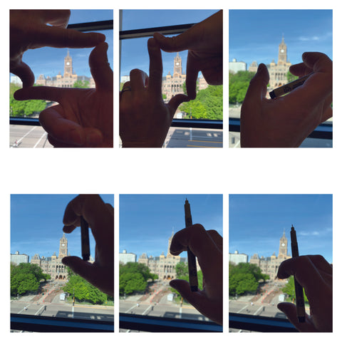 Multiple images of hands being held out in front of a distant building.  The hands are being used to  measure the proportions of the building, and being used to create a drawing boundary 