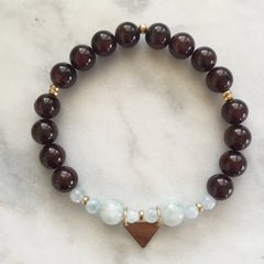 red garnet and aquamarine bracelet with gold triangle charm