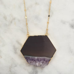 Amethyst slice necklace with gold edging and gold chain