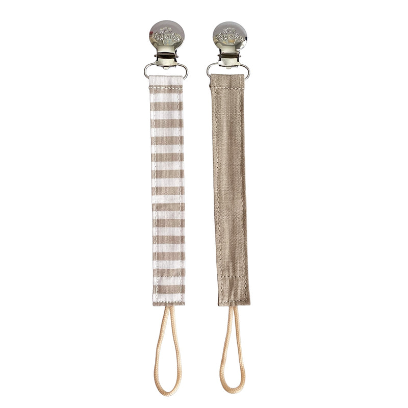 Ritzy Itzy Clip neutral linen pacifier straps against white back