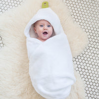 Puj hug baby towel being model by baby in lifestyle imagine