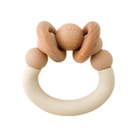 Pretty Please teethers mahogany rose orbit teething ring against white backdrop