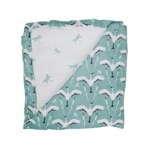 Bebe Au Lait crane and dragonfly oh-so-soft muslin snuggle blanket against white backdrop