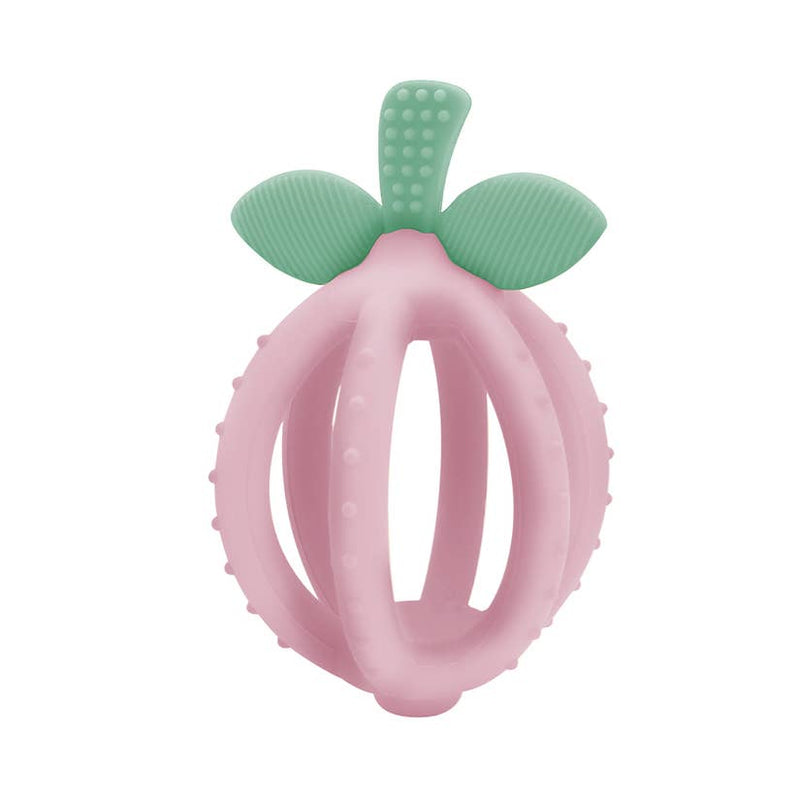 Itzy Ritzy pink lemon drop teething ball against white backdrop