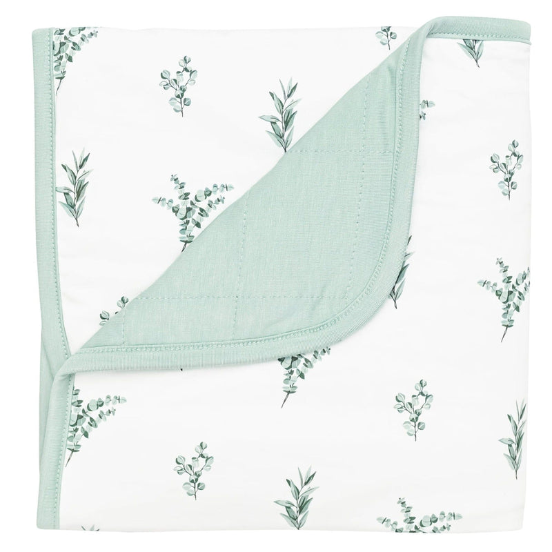 Kyte Baby eucalyptus baby blanket against white backdrop