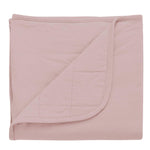 Kyte Baby sunset baby blanket against white backdrop