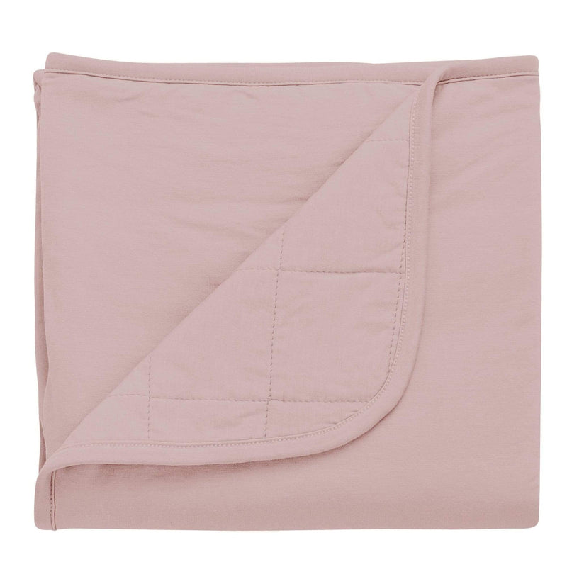 Kyte Baby sunset baby blanket against white backdrop