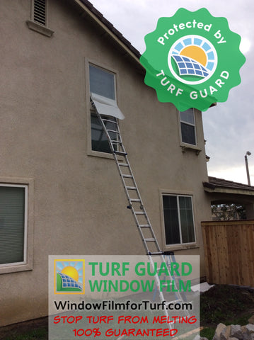 Turf Guard Window Film being applied to this house windows to stop reflection from damaging lawn