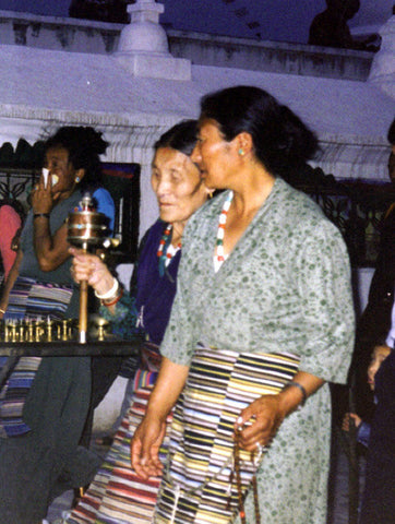 prayer wheel in use in nepal