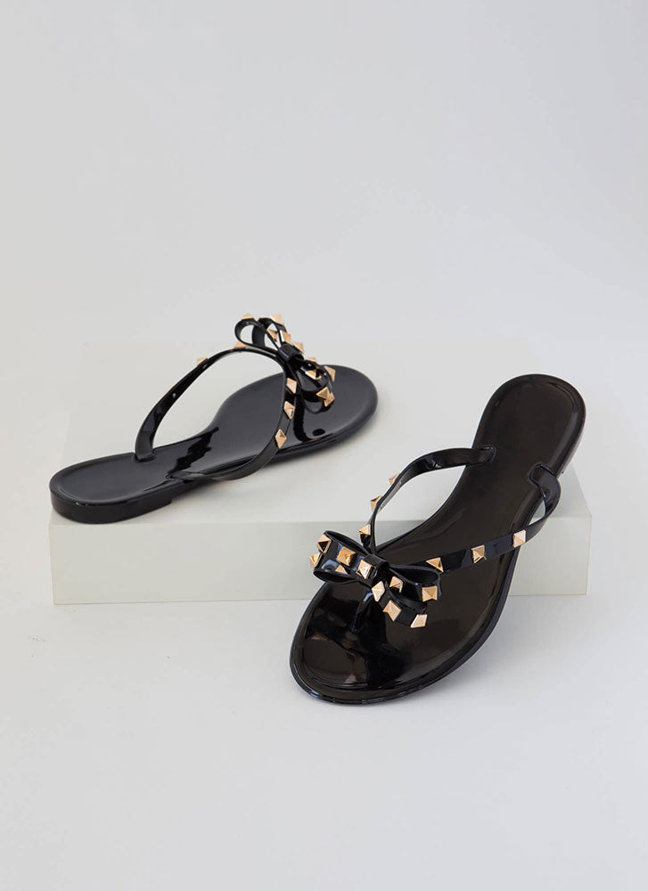 black jelly sandals with bow