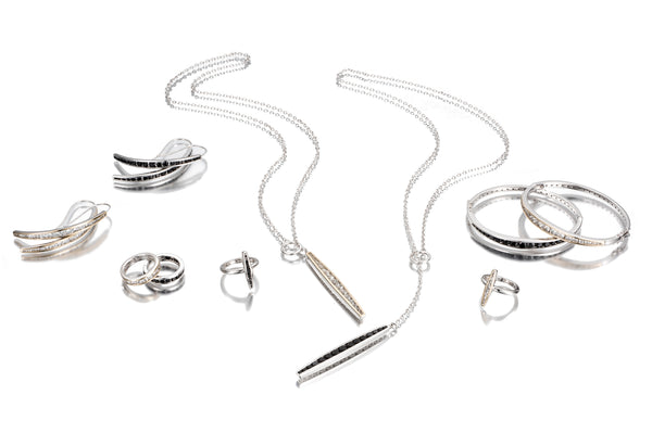 Simply Stunning: designs in polished silver with rows of channel set gemstones