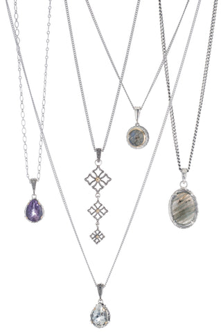 Layered chains and pendants, sterling silver and gemstones