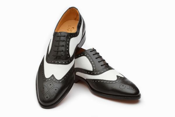 black and white wingtip oxfords