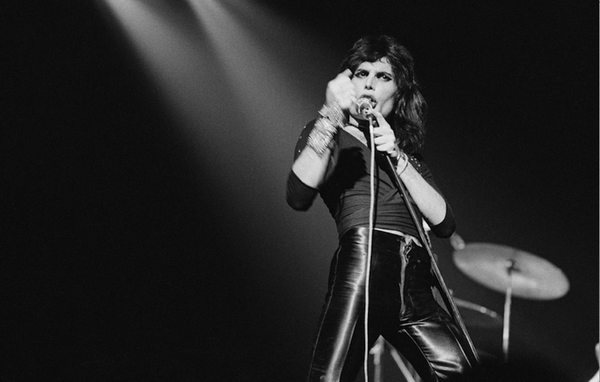 Freddie Mercury in concert. Photo by Michael Putland.