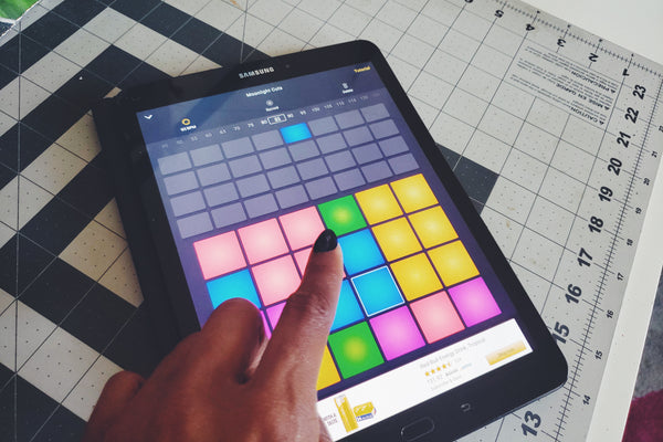 Alexandria Boddie uses DPM to make beats on her Samsung tablet.