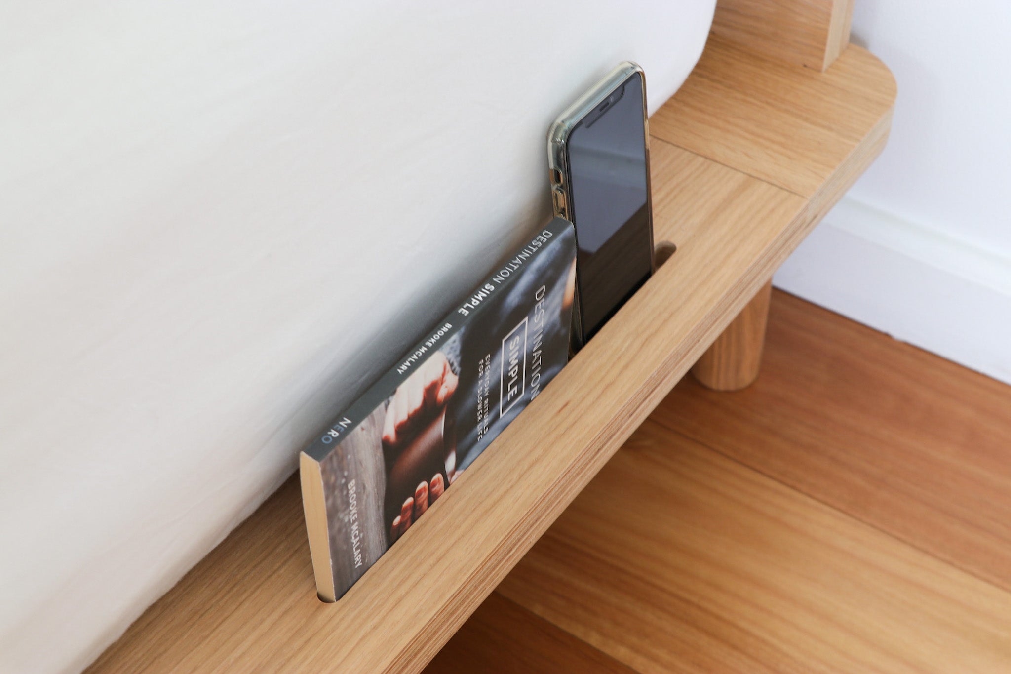 Device holder with book and phone Eva Timber Bed Frame