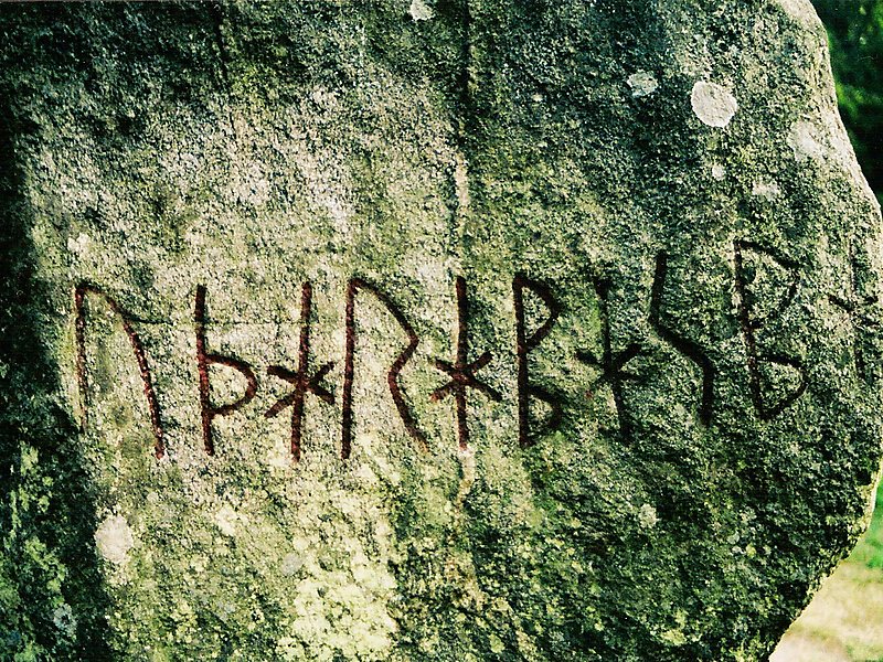 Image of runestone reading "I predict perdition"