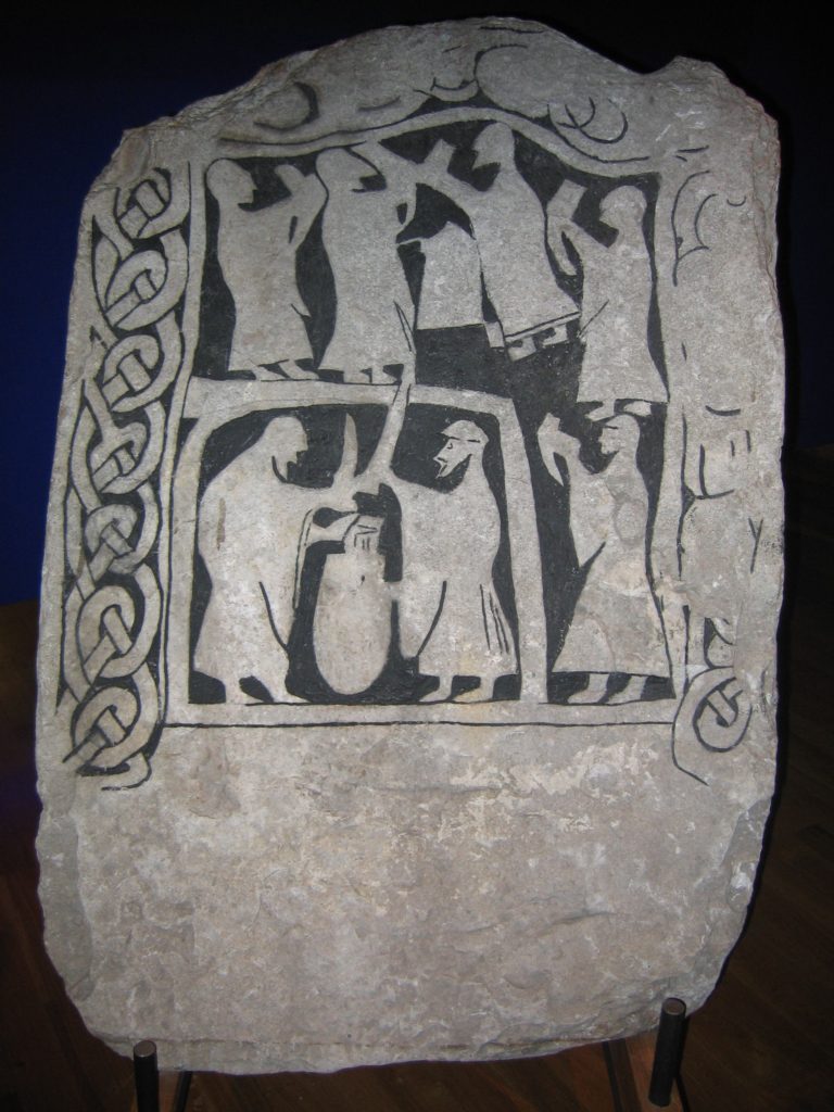 Image of Viking drinking party on stone