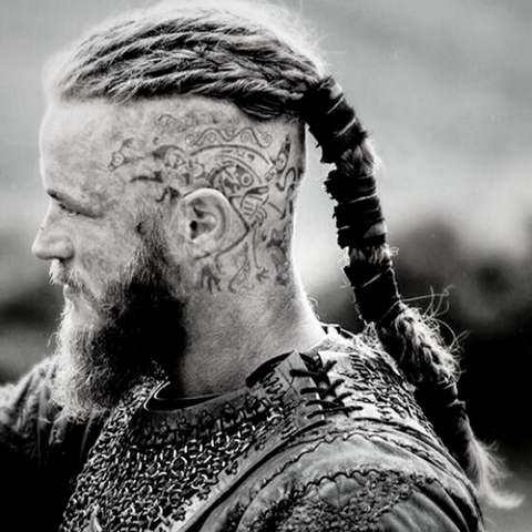 Viking ragnar tattoo in the head as Odin's tattoo