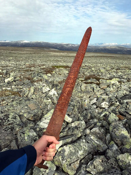 Viking sword artifact pulled out from stone in high altitude