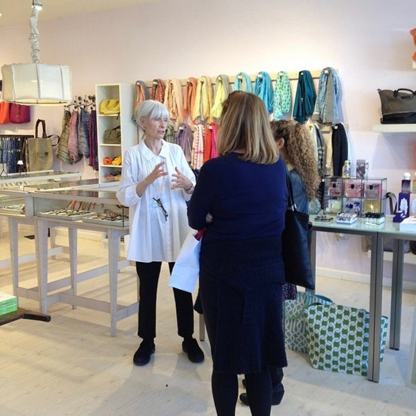 Paper Trail owner Serene Hastings chats with customers