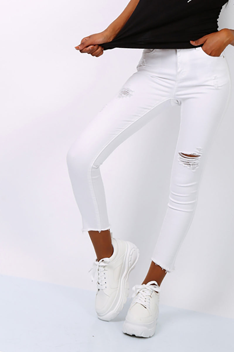 white ripped skinny jeans