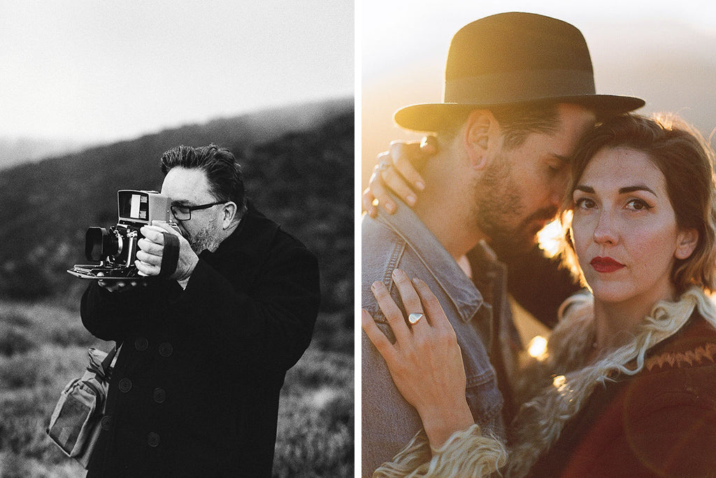 Black and white image of photographer shooting an image on a medium format camera