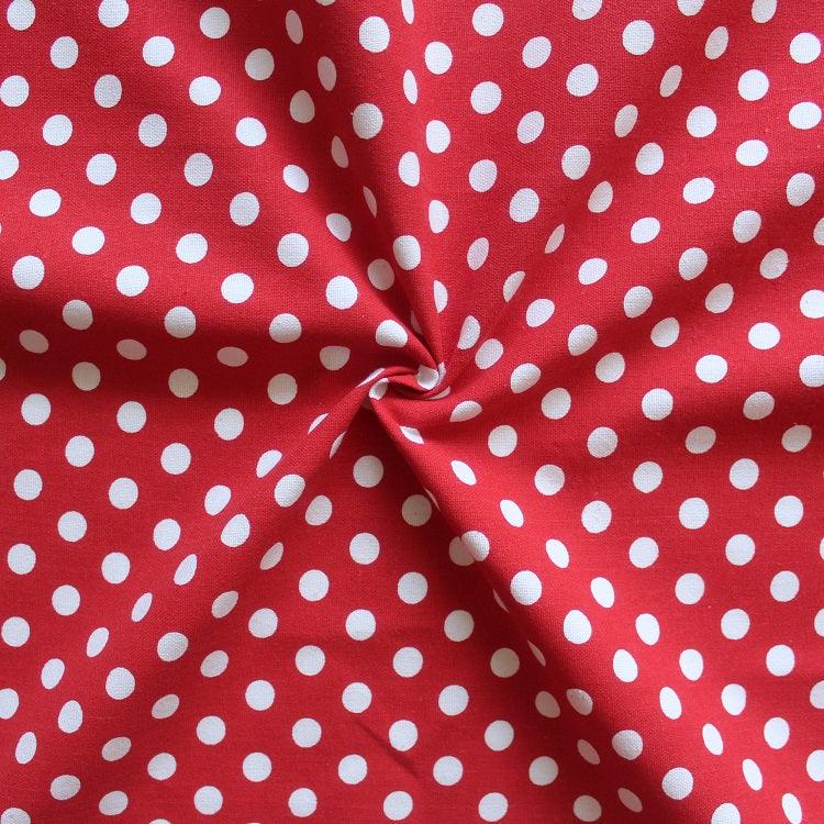 red spotty oven gloves