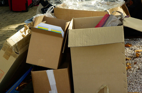 Unsustainable packaging cartons and boxes