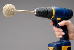 GourdMaster Easy Cleaner Ball Attached to an Electric Drill
