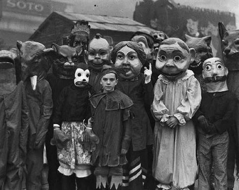 old b/w image of people in halloween costumes
