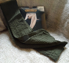 Colour sample olive green Oroblu Dune raised pattern opaque tights available in Australia.