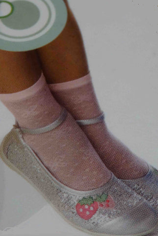 Girls feet wearing pale pink butterfly print ankle socks and silver Mary Jane shoes.