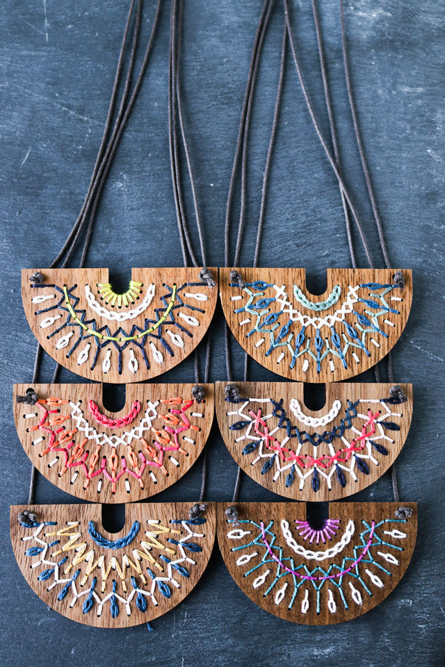 Walnut wood embroidered necklace kits by Red Gate Stitchery