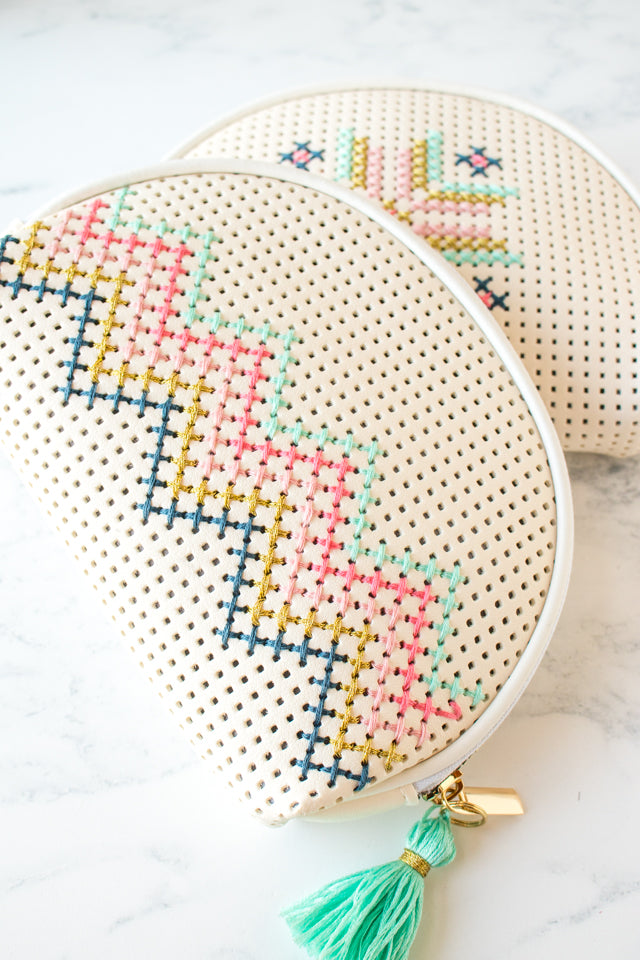 How to embellish a faux leather Target bag with cross stitching
