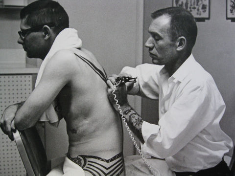 Fakir Musafar getting tattooed in 1955