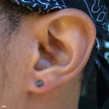 Earlobe piercing by Zach