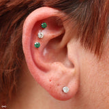 Helix piercings by Andru