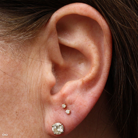 Stacked Earlobe Piercings by Andru