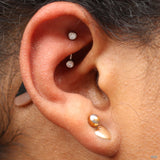 Rook piercing by Andru