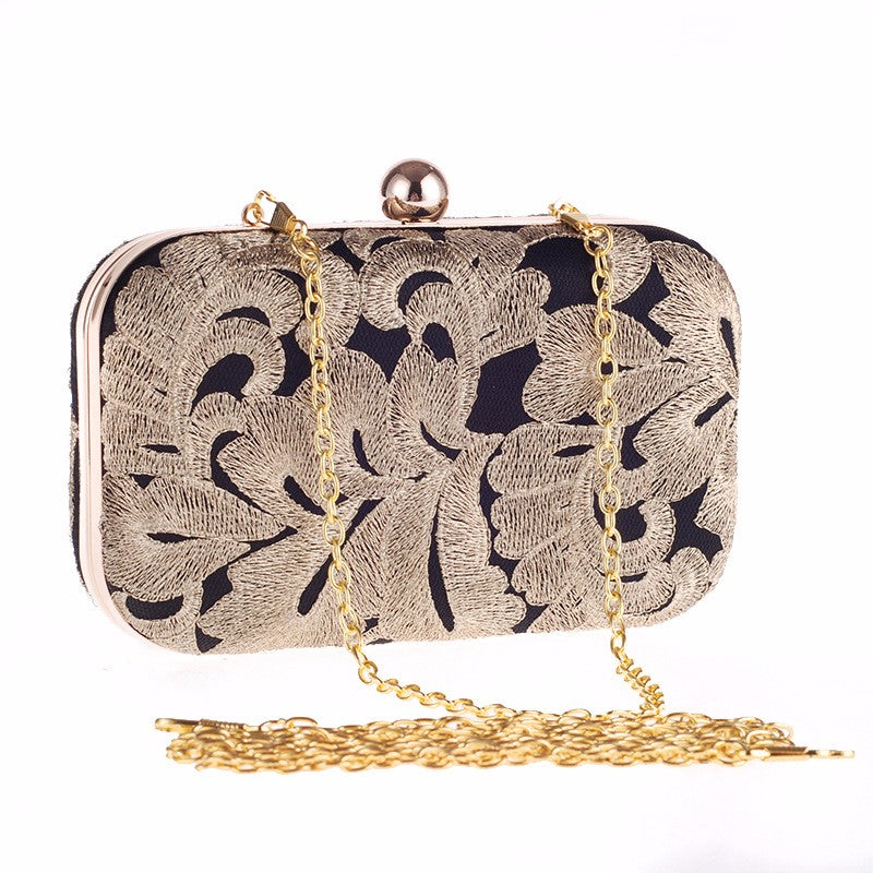 black and gold clutch bags uk