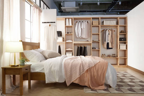 Add more balance to your sleep by placing your bed against the wall