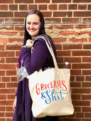 Model Carrying Canvas Tote Bag Full of Groceries