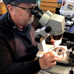 Graduate Gemologist Inspecting a Diamond