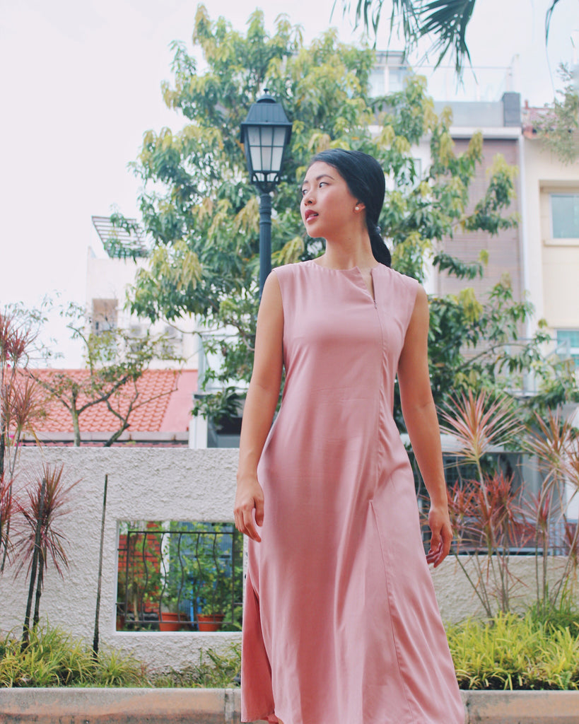 Elisa wearing Sleeveless Midi Dress in Dusty Pink