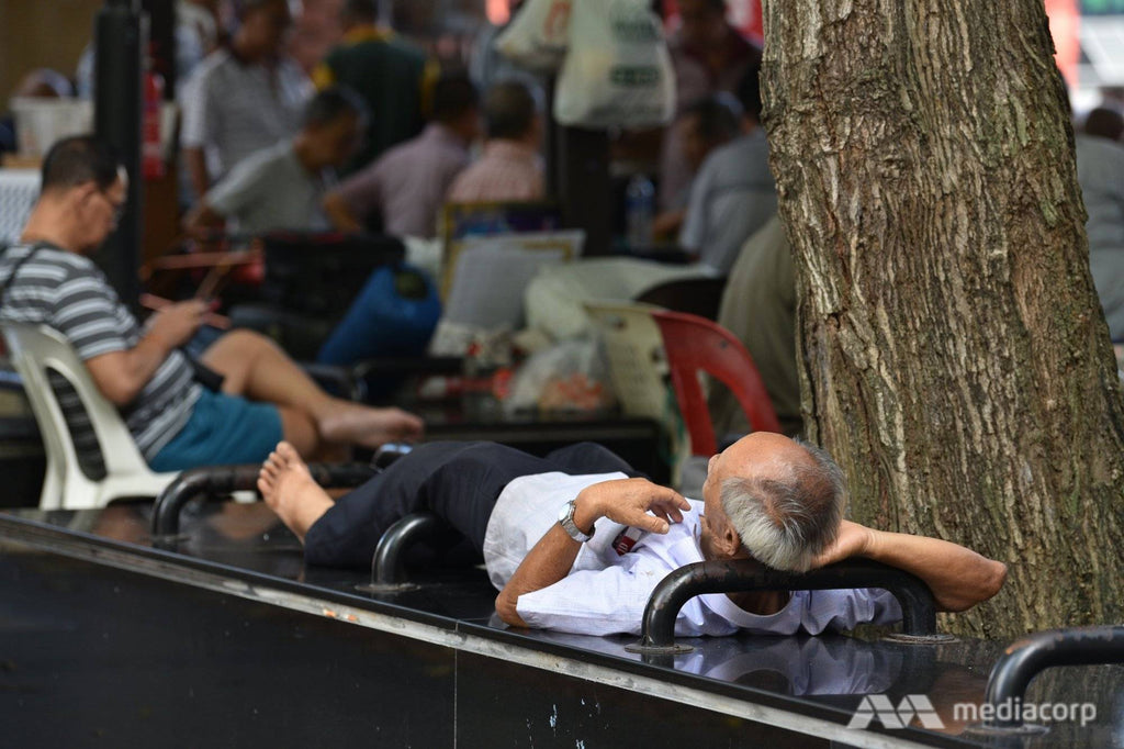 File photo of a senior citizen taking a nap in public