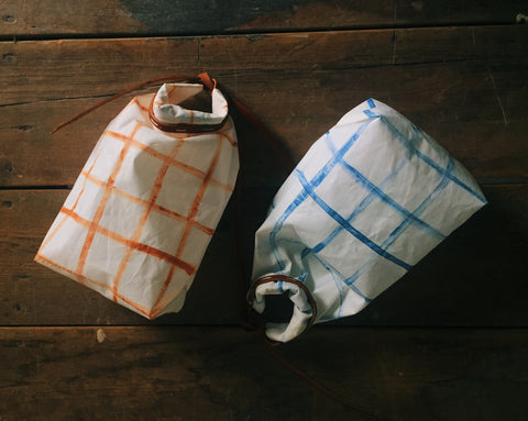 sustainable bags from recycled sails. Handmade in the USA. natural leather.