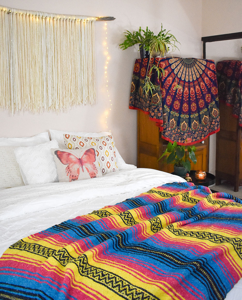 The Sunshine Day Dream blanket looks beautiful in the boho bedroom and adds so much color and warmth.